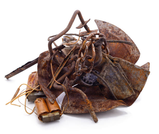 Old propeller with pile of scrap metal isolated on a white backسكراب بالرياض برق الرياضground.